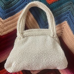 Lumered corde bead purse from the 50’s